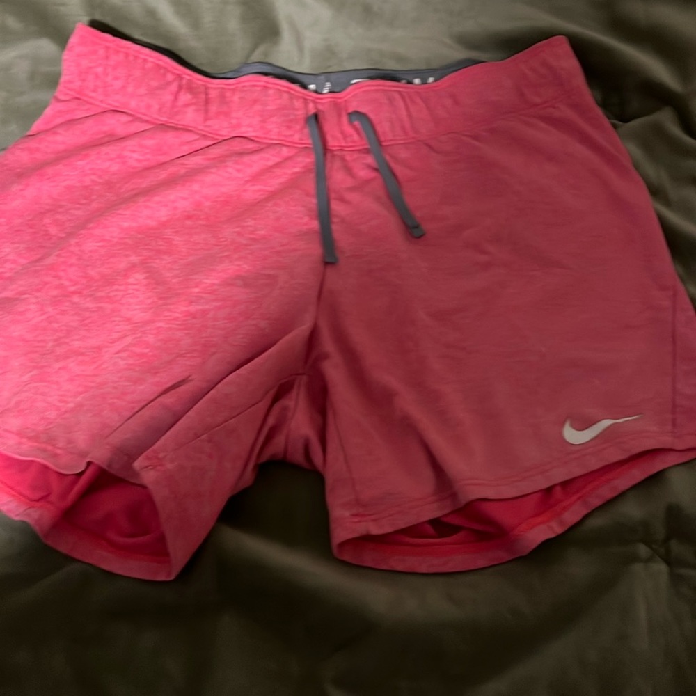 Hot pink Nike shorts